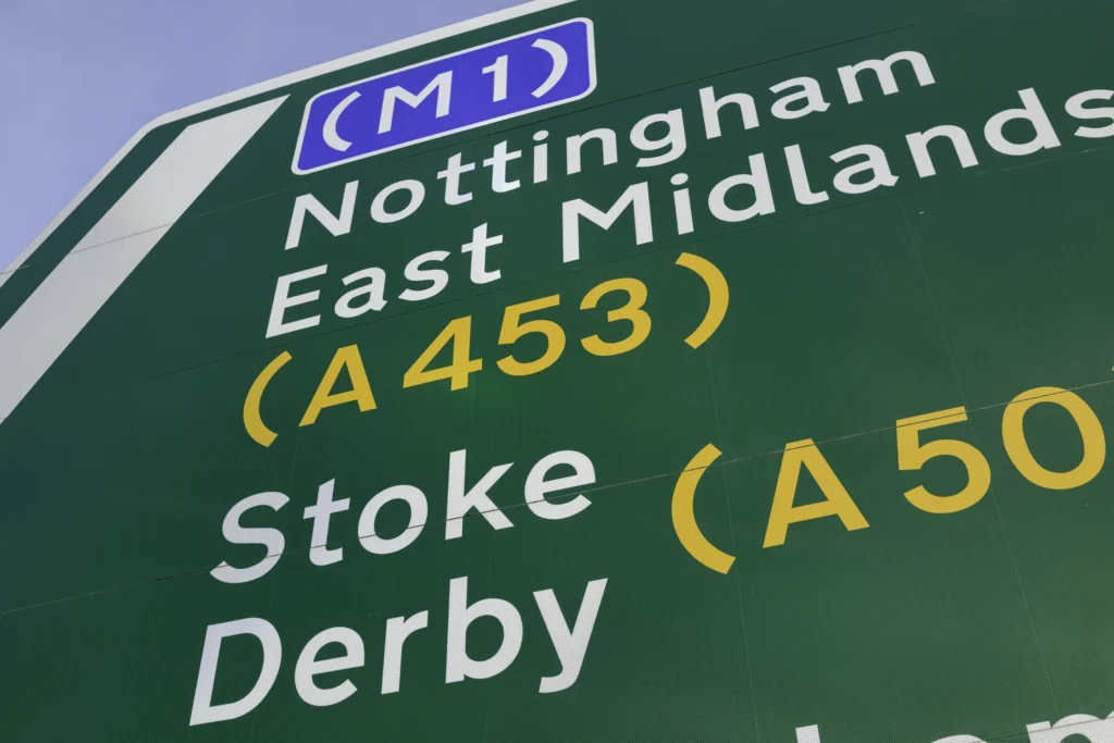 UK motorway sign showing directions to Nottingham, East Midlands, Stoke and Derby, highlighting the M1 corridor